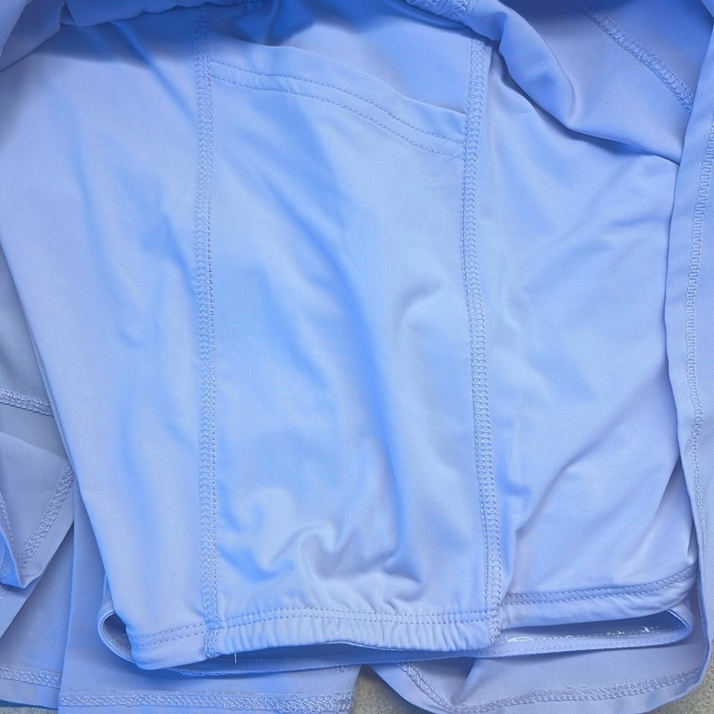 GB Sport Lilac skort. 2 side pockets on shorts under the skirt. Size L NWT - Picture 9 of 13